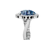 Halo Engagement Ring Setting for Fancy Blue Round Cut Center with Twist Band and Prong Head in Sterling Silver