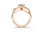 Channel-Set Engagement Ring Setting for Round Cut Center with Baguette Band and Prong Head in Rose Gold