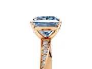 Side Accent Engagement Ring Setting for Fancy Blue Princess Cut Center with Accent Shoulders and Prong Head in Rose Gold