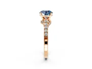 Solitaire Engagement Ring Setting for Fancy Blue Round Cut Center with Crossover Accents and Prong Head in Rose Gold