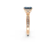 Cluster Engagement Ring Setting for Fancy Blue Emerald Cut Center with Bezel Accent Clusters and Prong Head in Rose Gold