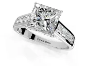 Solitaire Engagement Ring Setting for Princess Cut Center with Cathedral Channel Band and Prong Head in Platinum