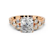 Cluster Engagement Ring Setting for Radiant Cut Center with Bezel Accent Clusters and Prong Head in Rose Gold