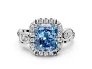 Halo Engagement Ring Setting for Fancy Blue Radiant Cut Center with Open Scroll Shoulders and Prong Head in White Gold