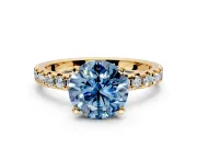 Solitaire Engagement Ring Setting for Fancy Blue Round Cut Center with Large Accents and Prong Head in Yellow Gold