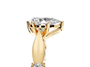 Solitaire Engagement Ring Setting for Pear-Shaped Center with Carved Leaf Shoulders and Prong Head in Yellow Gold