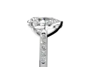 Solitaire Engagement Ring Setting for Pear-Shaped Center with Channel Accents and Prong Head in Platinum