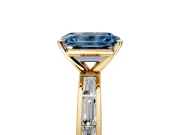 Solitaire Engagement Ring Setting for Fancy Blue Emerald Cut Center with Channel Baguette Band and Prong Head in Yellow Gold