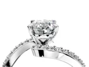 Solitaire Engagement Ring Setting for Oval Center with Pave Bypass Swirl Band and Prong Head in Platinum