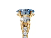3 Stone Engagement Ring Setting for Fancy Blue Oval Center with Crossover Basket, Pave Band and Prong Head in Yellow Gold