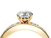Solitaire Engagement Ring Setting for Oval Center with Channel-Set Accents and Prong Head in Yellow Gold