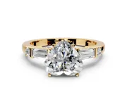 Bar-Set Engagement Ring Setting for Heart-Shaped Center with Tapered Baguette Accents and Prong Head in Yellow Gold