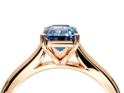Solitaire Engagement Ring Setting for Fancy Blue Emerald Cut Center with Narrow Cathedral Band and Prong Head in Rose Gold