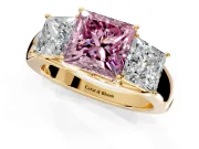 3 Stone Engagement Ring Setting for Fancy Pink Princess Cut Center with Raised Basket Heads and Prong Head in Yellow Gold