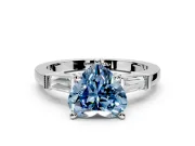 3 Stone Engagement Ring Setting for Fancy Blue Heart-Shaped Center with Channel Baguette Accents and Prong Head in Platinum