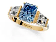 Channel-Set Engagement Ring Setting for Fancy Blue Radiant Cut Center with Baguette Band and Prong Head in Yellow Gold