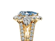 Halo Engagement Ring Setting for Fancy Blue Pear-Shaped Center with Two-Strand Split Shank and Prong Head in Yellow Gold