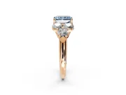 Cluster Engagement Ring Setting for Fancy Blue Radiant Cut Center with Round Cut Accent Frame and Prong Head in Rose Gold
