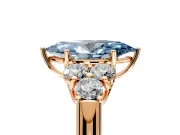 Cluster Engagement Ring Setting for Fancy Blue Marquise Center with Round Cut Accent Frame and Prong Head in Rose Gold