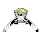 Solitaire Engagement Ring Setting for Fancy Yellow Pear-Shaped Center with Accented Twist Band and Leaf Prong Head in Platinum