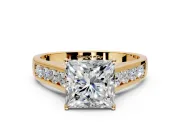 Solitaire Engagement Ring Setting for Princess Cut Center with Cathedral Channel Band and Prong Head in Yellow Gold