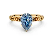 Solitaire Engagement Ring Setting for Fancy Blue Pear-Shaped Center with XO Engraved Band and Prong Head in Yellow Gold