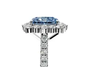 Halo Engagement Ring Setting for Fancy Blue Radiant Cut Center with Single-Row Pave, Open Basket and Prong Head in Platinum