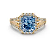 Halo Engagement Ring Setting for Fancy Blue Radiant Cut Center with Pave Split Shank and Prong Head in Yellow Gold