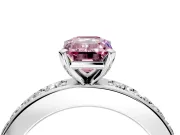 Solitaire Engagement Ring Setting for Fancy Pink Emerald Cut Center with Channel-Set Accents and Prong Head in Platinum