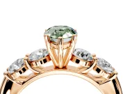 5 Stone Engagement Ring Setting for Fancy Green Pear-Shaped Center with Graduated Accents and Prong Head in Rose Gold