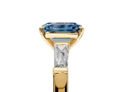 3 Stone Engagement Ring Setting for Fancy Blue Emerald Cut Center with Tapered Baguettes, Plain Band and Prong Head in Yellow Gold