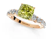 Shared-Prong Engagement Ring Setting for Fancy Yellow Cushion Cut Center with Graduated Accents and Prong Head in Rose Gold