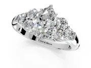 Cluster Engagement Ring Setting for Pear-Shaped Center with Round Cut Accent Frame and Prong Head in White Gold