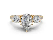 3 Stone Engagement Ring Setting for Pear-Shaped Center with Crossover Basket, Pave Band and Prong Head in Yellow Gold