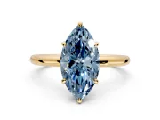Low-Set Solitaire Engagement Ring Setting for Fancy Blue Oval Center with Thin Plain Band and Prong Head in Yellow Gold