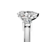 3 Stone Engagement Ring Setting for Pear-Shaped Center with Wide Plain Band and Prong Head in Platinum