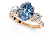 3 Stone Engagement Ring Setting for Fancy Blue Oval Center with Crossover Basket, Pave Band and Prong Head in Rose Gold