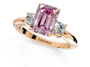 3 Stone Engagement Ring Setting for Fancy Pink Emerald Cut Center with Wide Plain Band and Prong Head in Rose Gold