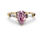3 Stone Engagement Ring Setting for Fancy Pink Pear-Shaped Center with Channel Baguette Accents and Prong Head in Yellow Gold