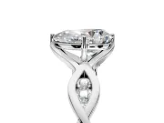 Solitaire Engagement Ring Setting for Pear-Shaped Center with Accented Twist Band and Leaf Prong Head in Sterling Silver