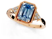 Cluster Engagement Ring Setting for Fancy Blue Emerald Cut Center with Milgrain Shoulder Clusters and Prong Head in Rose Gold