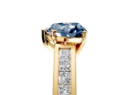 Solitaire Engagement Ring Setting for Fancy Blue Heart-Shaped Center with Princess Cut Channel Band and Prong Head in Yellow Gold