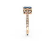 Cathedral Engagement Ring Setting for Fancy Blue Emerald Cut Center with Antique-Style Pave Band and Prong Head in Rose Gold