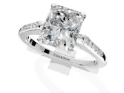 Solitaire Engagement Ring Setting for Radiant Cut Center with Channel Accents and Prong Head in Platinum
