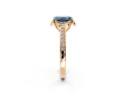 Floral Engagement Ring Setting for Fancy Blue Emerald Cut Center with Four Accent Clusters and Prong Head in Rose Gold