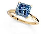 Solitaire Engagement Ring Setting for Fancy Blue Princess Cut Center with Narrow Cathedral Band and Prong Head in Yellow Gold
