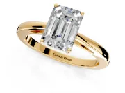 Solitaire Engagement Ring Setting for Emerald Cut Center with Open Cathedral Shoulders and Prong Head in Yellow Gold