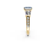 Channel-Set Engagement Ring Setting for Fancy Blue Radiant Cut Center with Baguette Band and Prong Head in Yellow Gold