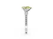 3 Stone Engagement Ring Setting for Fancy Yellow Pear-Shaped Center with Round Cut Side Accents and Prong Head in Platinum