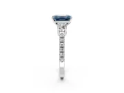 3 Stone Engagement Ring Setting for Fancy Blue Emerald Cut Center with Round Cut Side Accents and Prong Head in White Gold